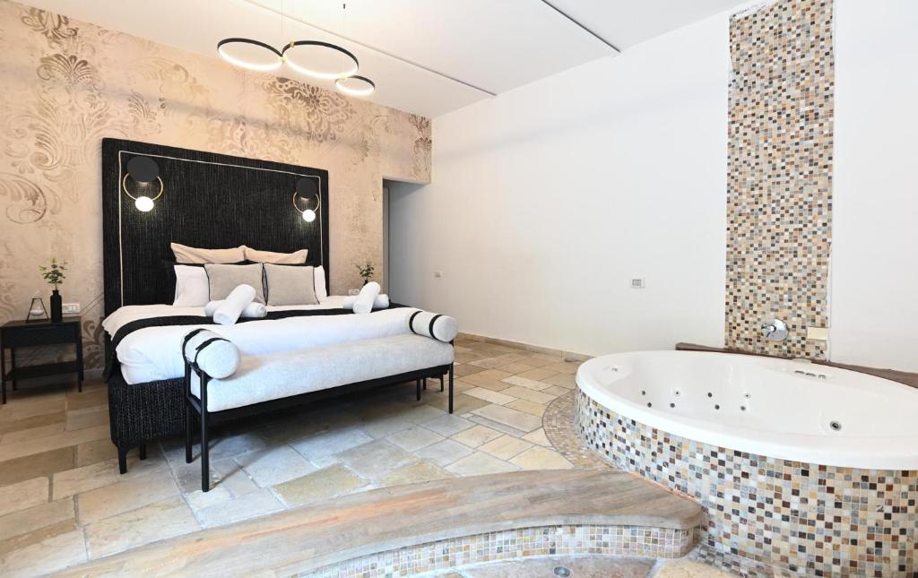 Postel nebo postele na pokoji v ubytování YalaRent - Liri Resort