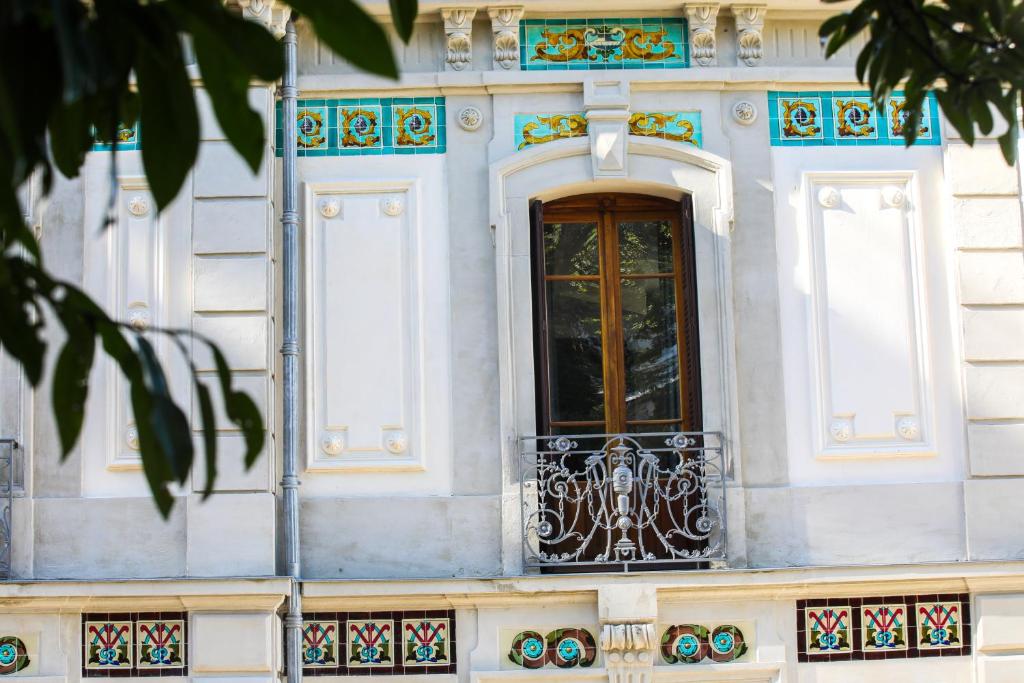 a building with a window on the side of it at Villa Saint Enogat in Aix-les-Bains