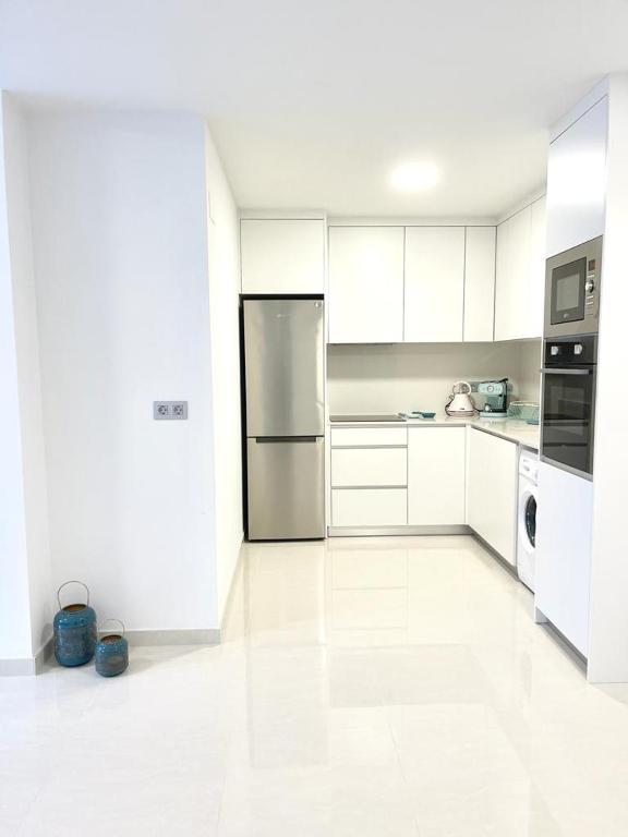 Kuchyňa alebo kuchynka v ubytovaní Luxury Apartment Torrevieja