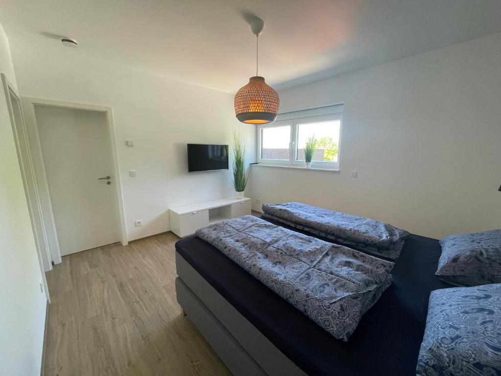 TV a/nebo společenská místnost v ubytování Casa 47
