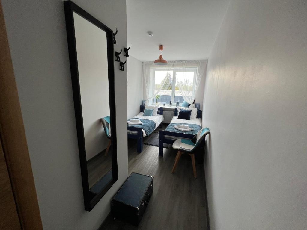 TV a/nebo společenská místnost v ubytování Hotel "Senleja"