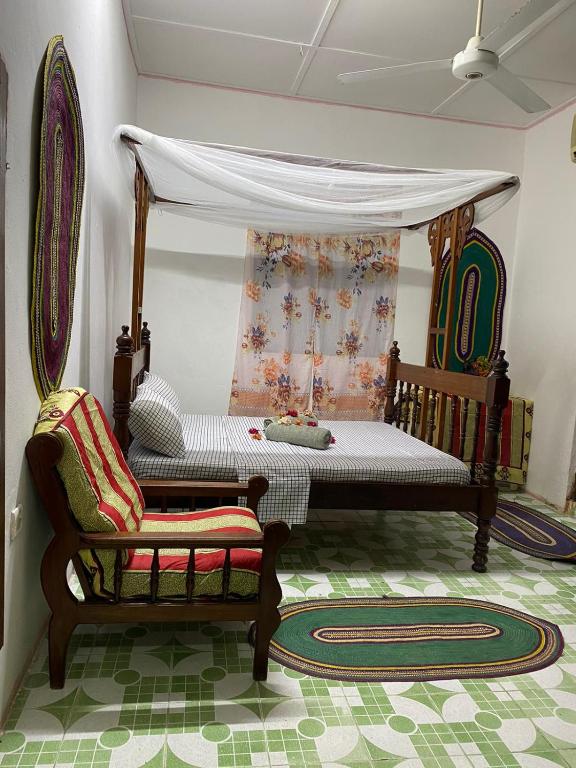 Postel nebo postele na pokoji v ubytování Sanaa Hostel