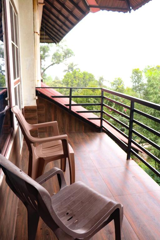 Balkón nebo terasa v ubytování Coorg Nature Breeze home stay