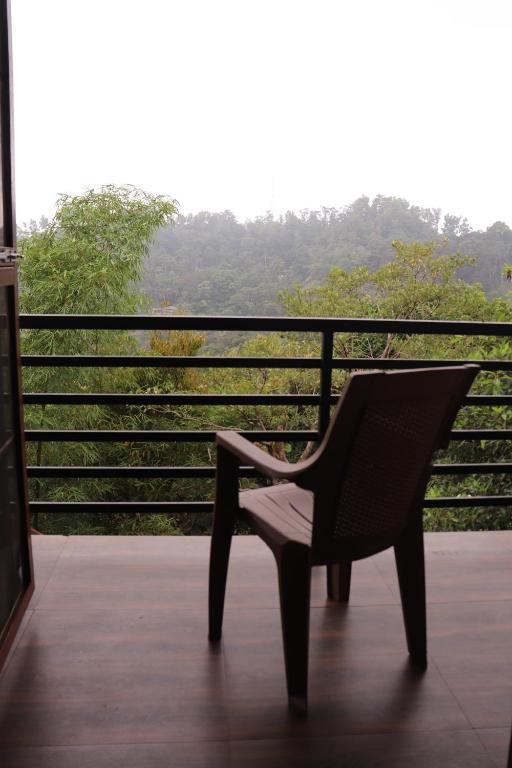 Balkón nebo terasa v ubytování Coorg Nature Breeze home stay