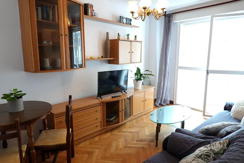 Televízia a/alebo spoločenská miestnosť v ubytovaní Piso con excelente ubicación