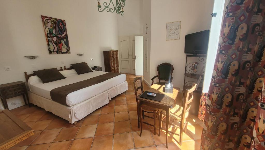 Postel nebo postele na pokoji v ubytování Hotel Du Forum