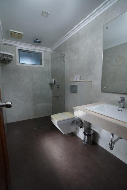 Koupelna v ubytování TGR SUITES