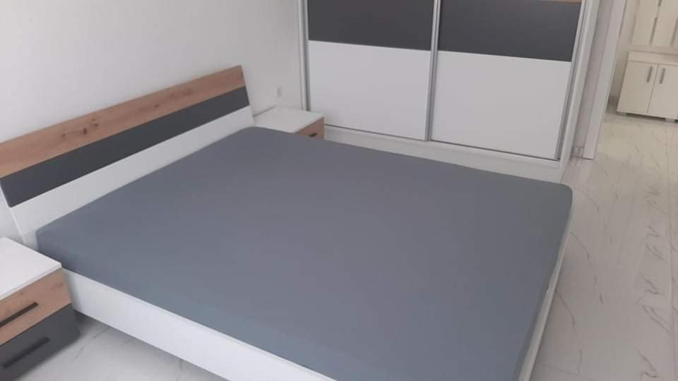 Ένα ή περισσότερα κρεβάτια σε δωμάτιο στο Ohrid-Struga Ezerski Lozja
