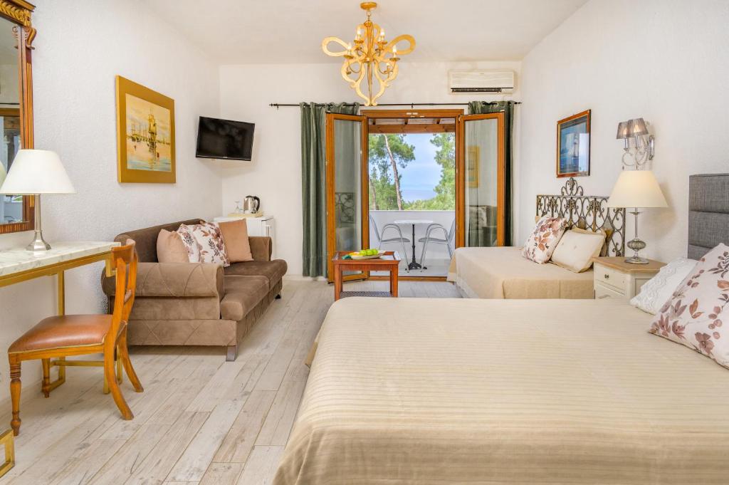 Posezení v ubytování Leandros Hotel