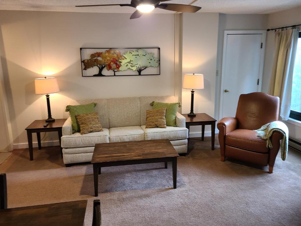 a living room with a couch and two chairs at Silver Creek Unit 5404, Ski in-out, Pool Hot Tub in Snowshoe