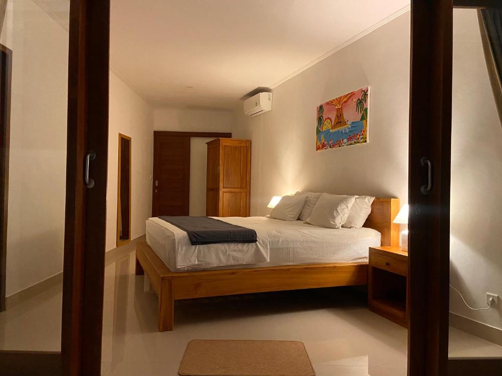 Postel nebo postele na pokoji v ubytování Balian Hideaway