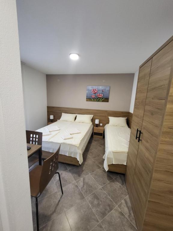 Postel nebo postele na pokoji v ubytování Vila Pčelica Petra