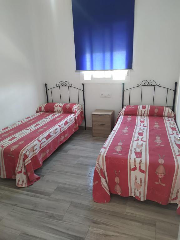 Postel nebo postele na pokoji v ubytování Casa la Alberca