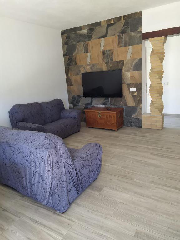 TV a/nebo společenská místnost v ubytování Casa la Alberca