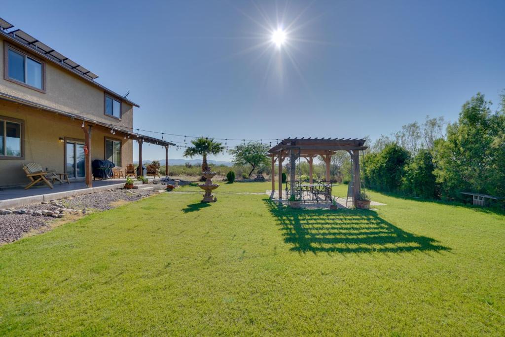 a garden with a gazebo in the yard at 9 Mi to Sahuarita Lake Park Getaway with Game Room in Sahuarita