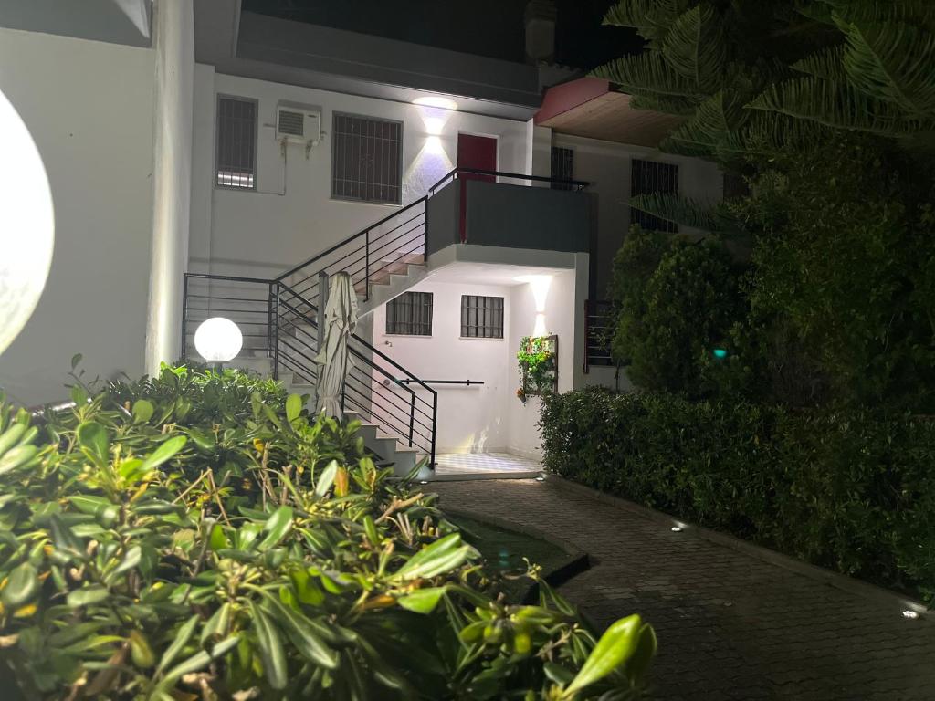 a house with a staircase in front of it at night at Villa Gemma in Campomarino
