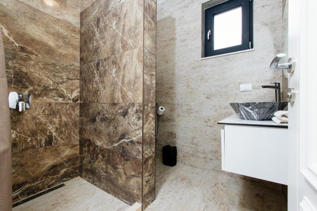 Koupelna v ubytování Lira Suites