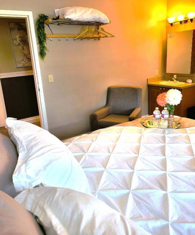 Postel nebo postele na pokoji v ubytování Royal Duke Hotel