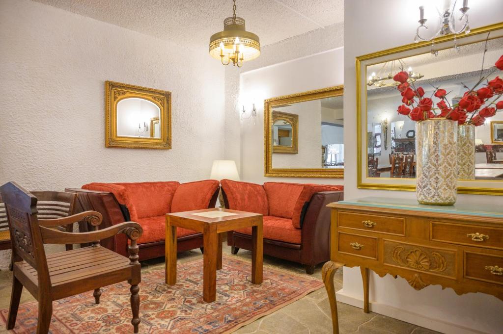 Posezení v ubytování Leandros Hotel