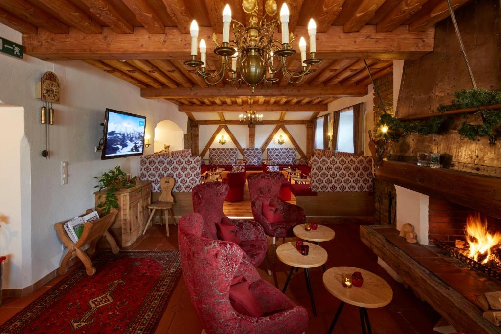 Posezení v ubytování Hotel Schwarzer Adler