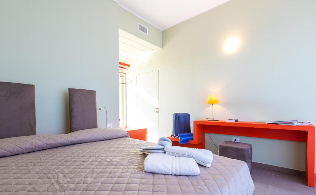 Postel nebo postele na pokoji v ubytování Fani Rooms