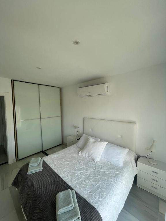 Postel nebo postele na pokoji v ubytování Apartamento 3 HOME SUITES ALMERÍA