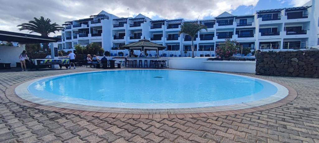 Bazén v ubytování Gibshouses Playa Bastian nebo v jeho okolí