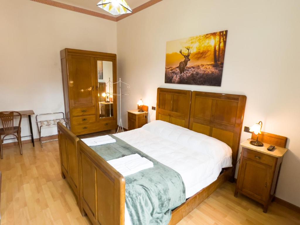 Postel nebo postele na pokoji v ubytování Monte Marsicano Hotel