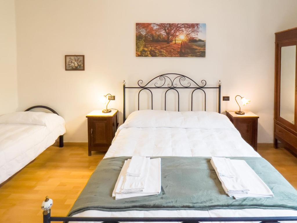 Postel nebo postele na pokoji v ubytování Monte Marsicano Hotel