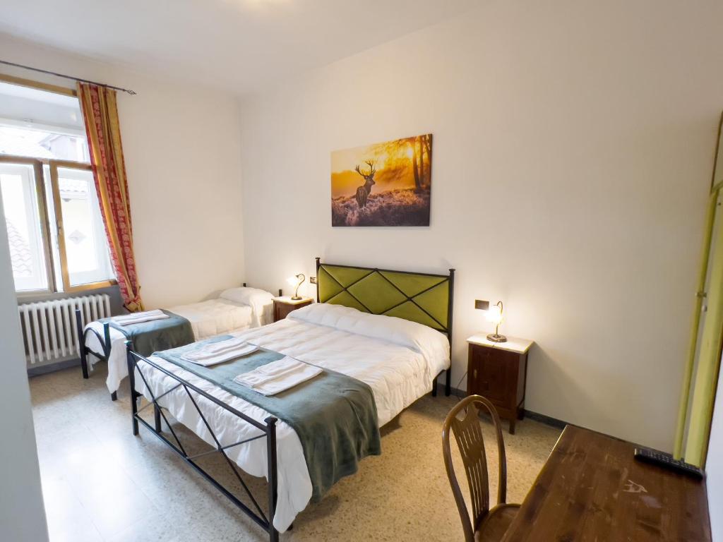 Postel nebo postele na pokoji v ubytování Monte Marsicano Hotel