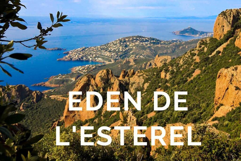 a view of a mountain with the words eaten be leftered at L'Eden de l'Esterel in LʼÉglise