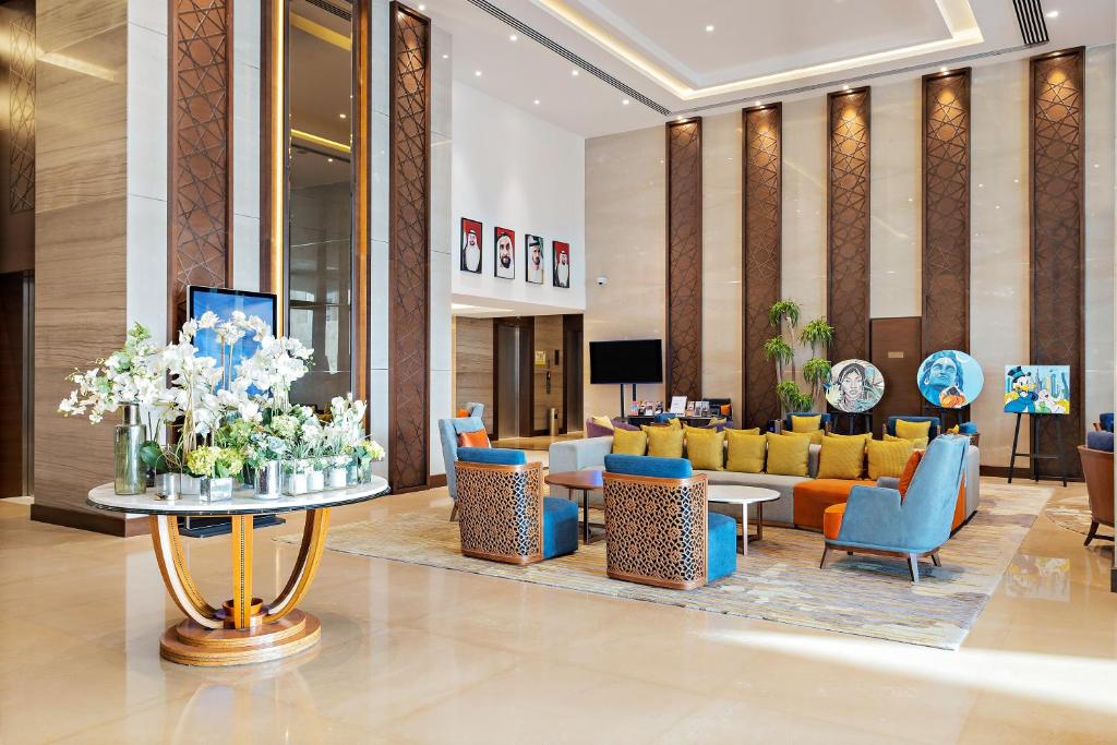 TV a/nebo společenská místnost v ubytování Ramee Dream Hotel Downtown
