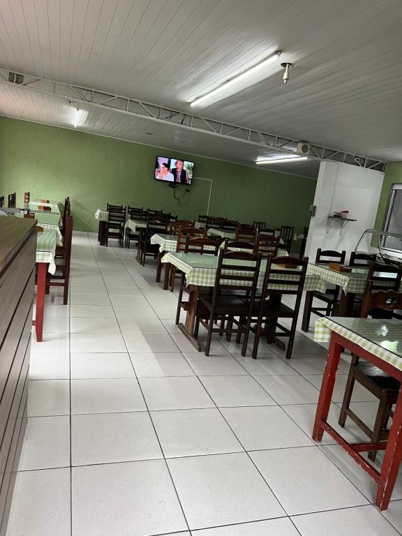 Restoranas ar kita vieta pavalgyti apgyvendinimo įstaigoje Pousada do Genesio