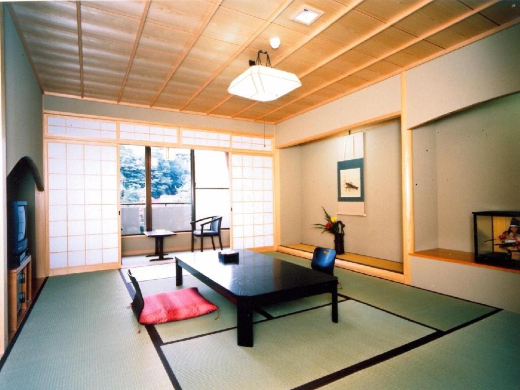 Posezení v ubytování Kadonobo Ryokan