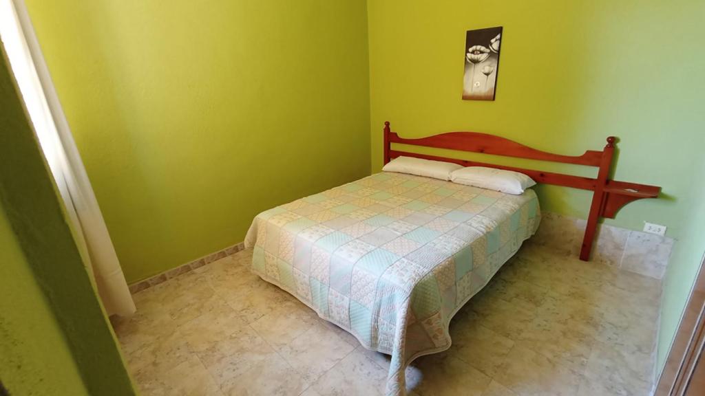 Postel nebo postele na pokoji v ubytování Villa Tonys