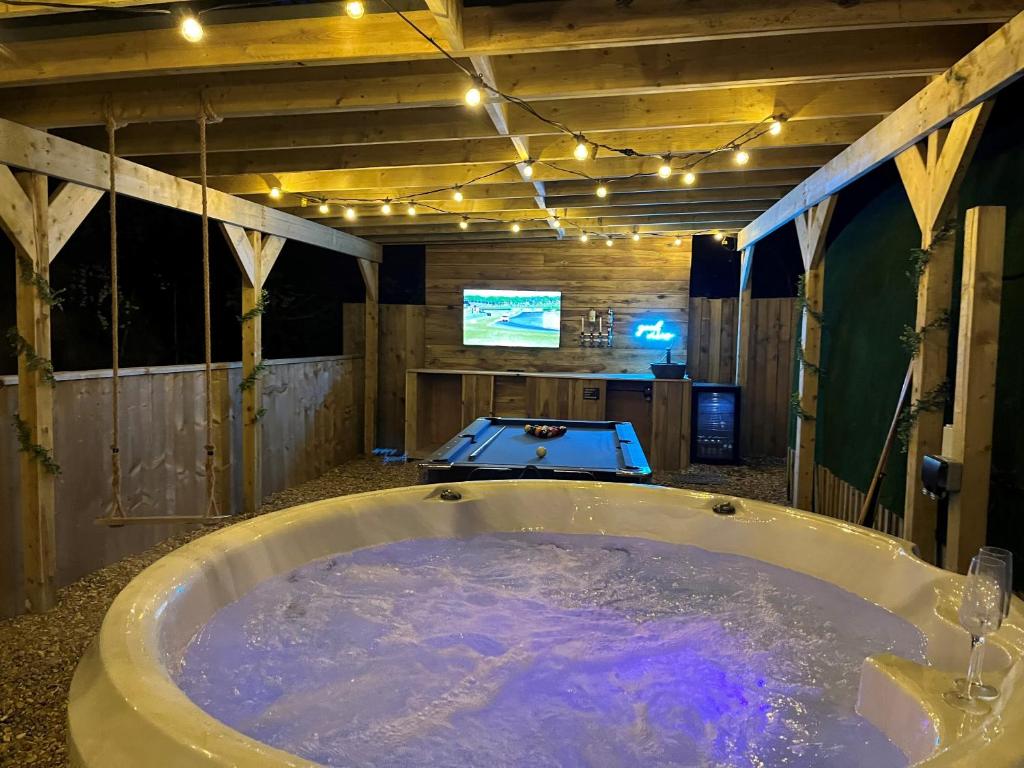 TV a/nebo společenská místnost v ubytování Calon