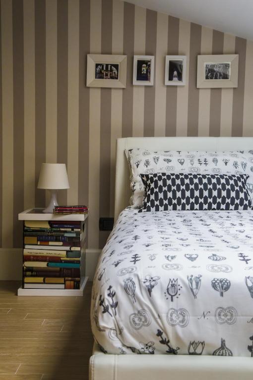 Posteľ alebo postele v izbe v ubytovaní Piazza Roma Rooms