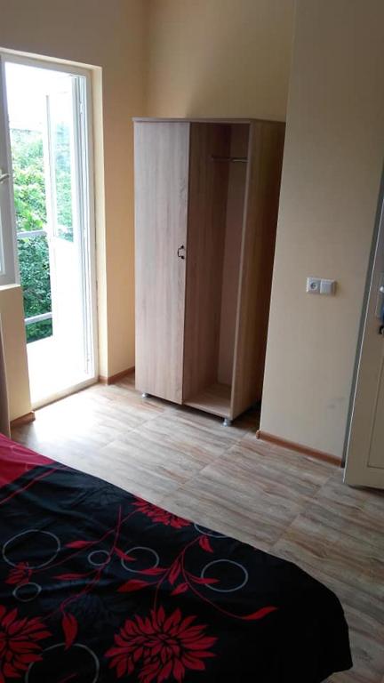 Postel nebo postele na pokoji v ubytování Отел Нана