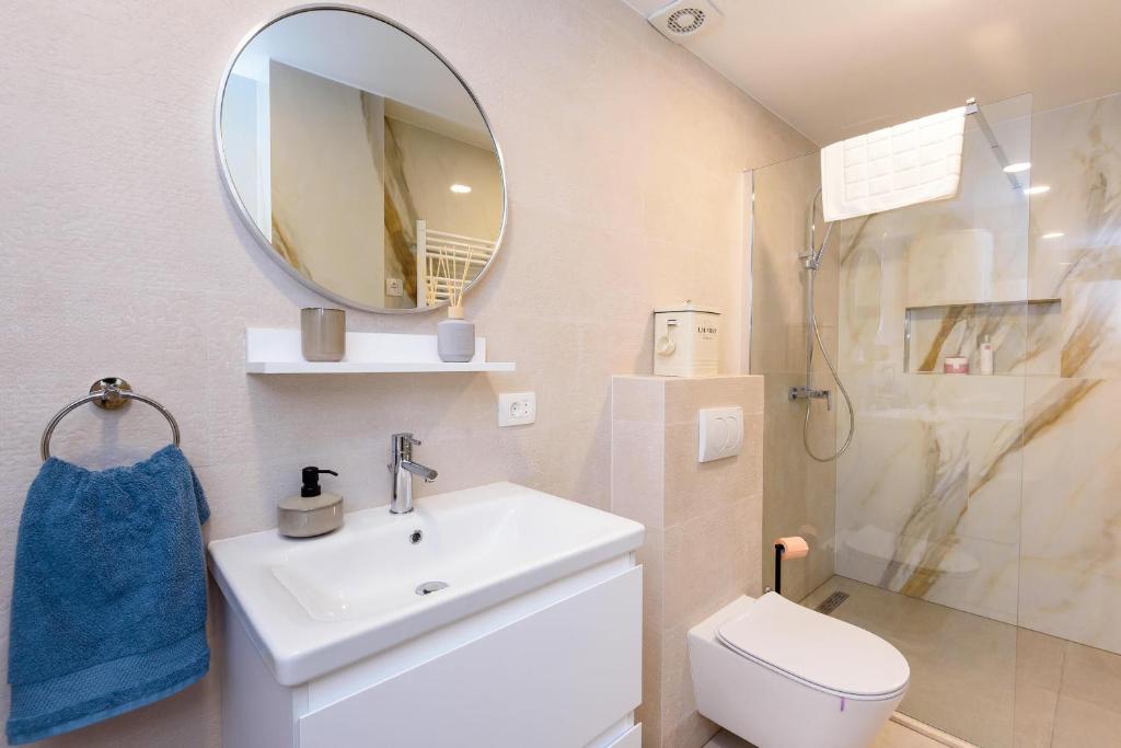 Koupelna v ubytování Apartmani Boras
