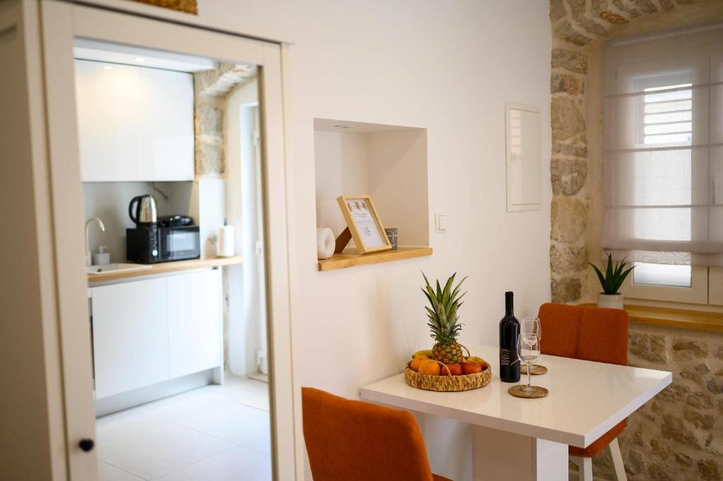 Kuchyň nebo kuchyňský kout v ubytování Apartmani Boras