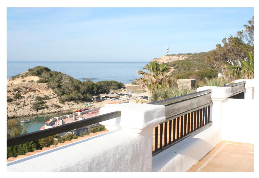 a balcony with a view of the ocean at Apartmentos Nort in Portinatx