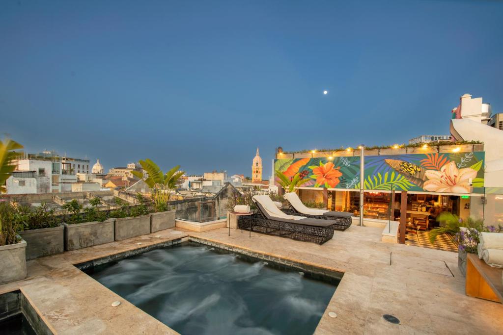 a swimming pool on the roof of a building at Voilá Centro Histórico in Cartagena de Indias