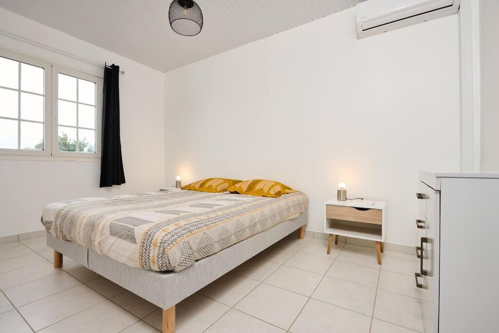 Postel nebo postele na pokoji v ubytování Villa Pampa
