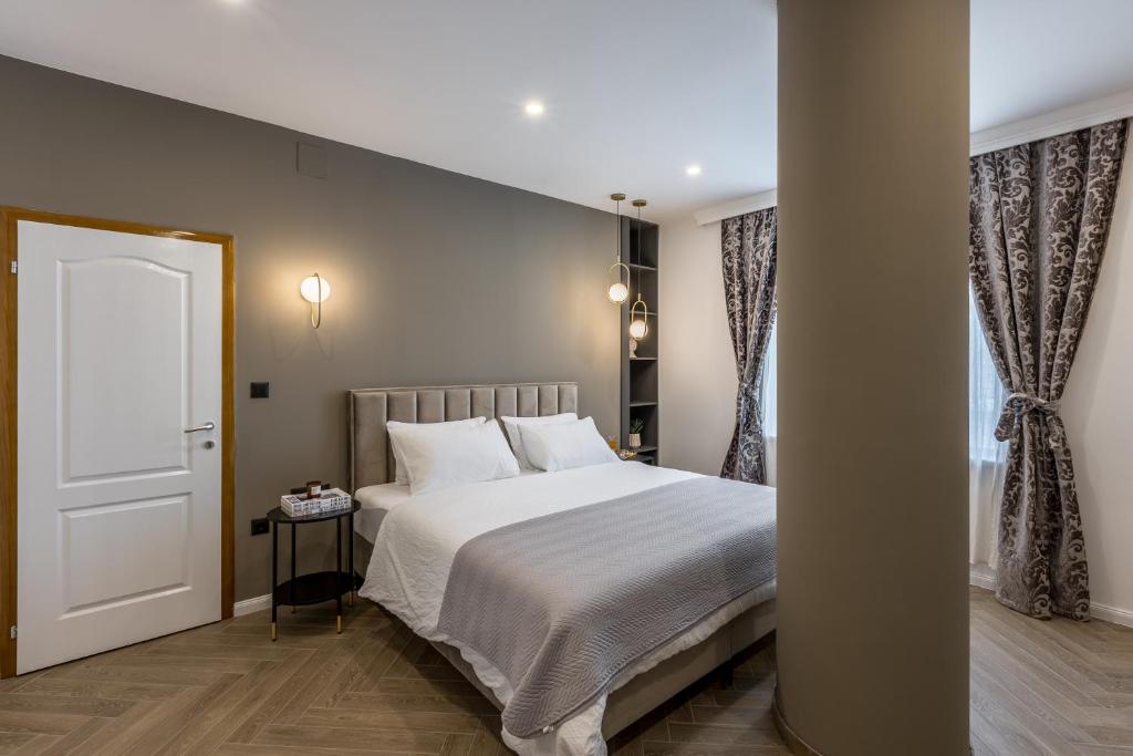 Posteľ alebo postele v izbe v ubytovaní Luxury rooms Bolero