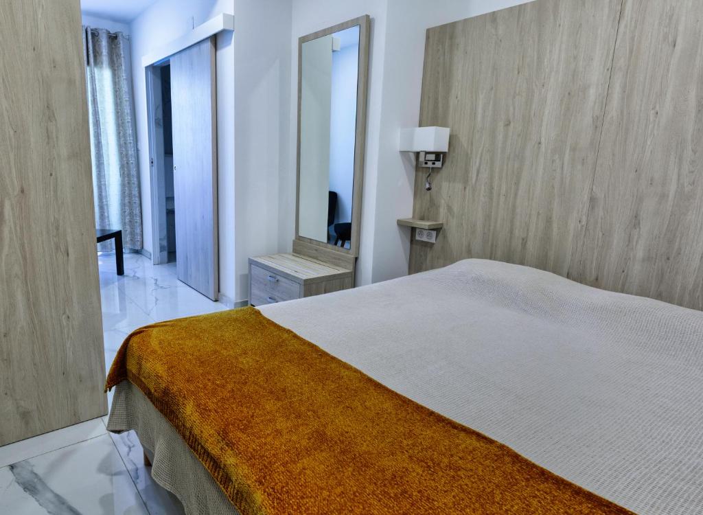 Postel nebo postele na pokoji v ubytování Hôtel Mare E Monti