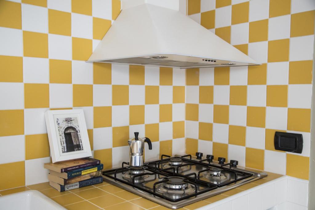 Kuchyňa alebo kuchynka v ubytovaní Piazza Roma Rooms