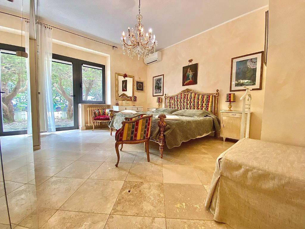 Postel nebo postele na pokoji v ubytování Le due palme Bed & Breakfast