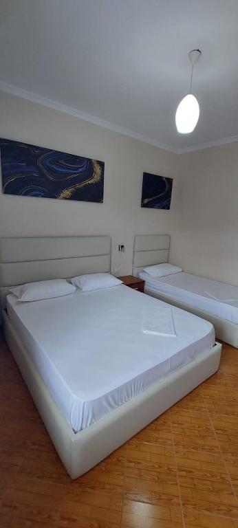 Postel nebo postele na pokoji v ubytování HOTEL KRISTAL