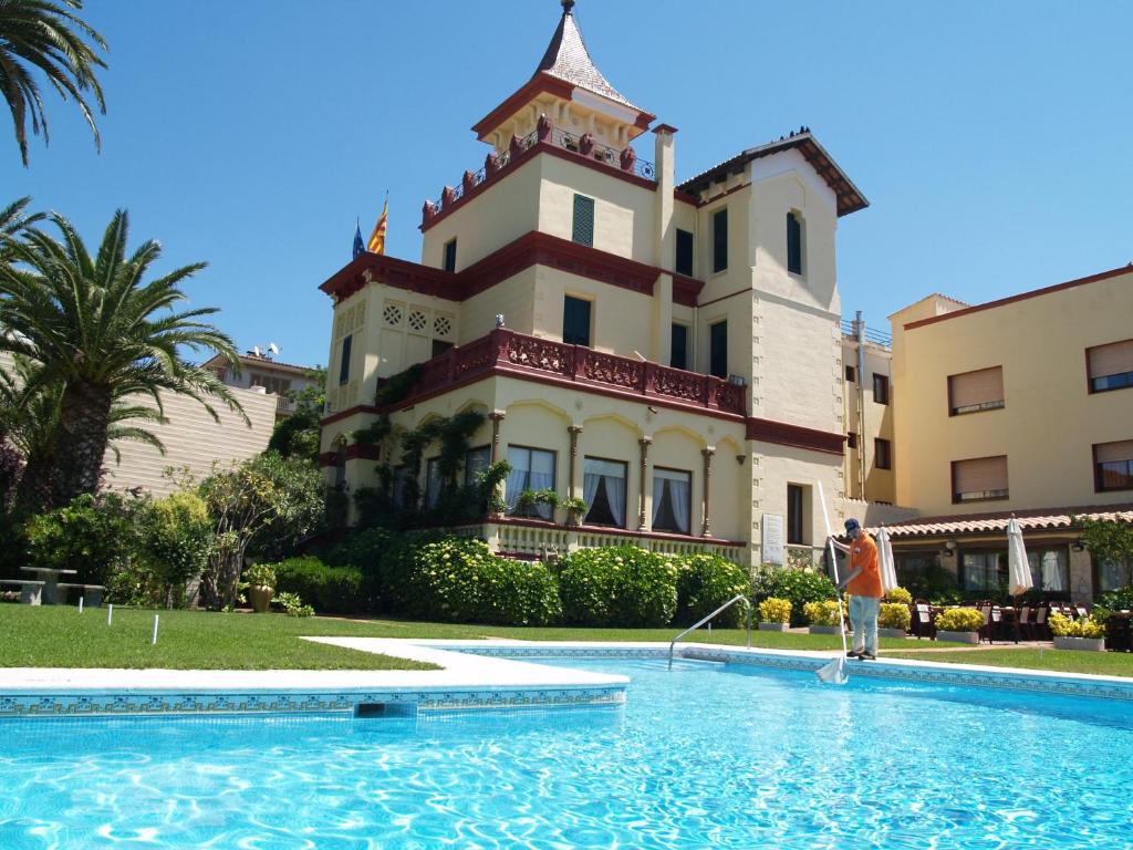 Bazén v ubytování Hotel Hostal del Sol nebo v jeho okolí