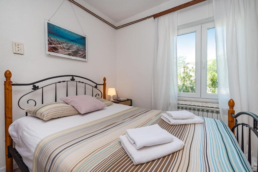 Posteľ alebo postele v izbe v ubytovaní Vacation house Anna